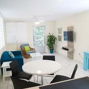 https://buena-vida-apartments.comcaribbean.com